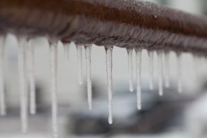 Close-up of frozen water pipe