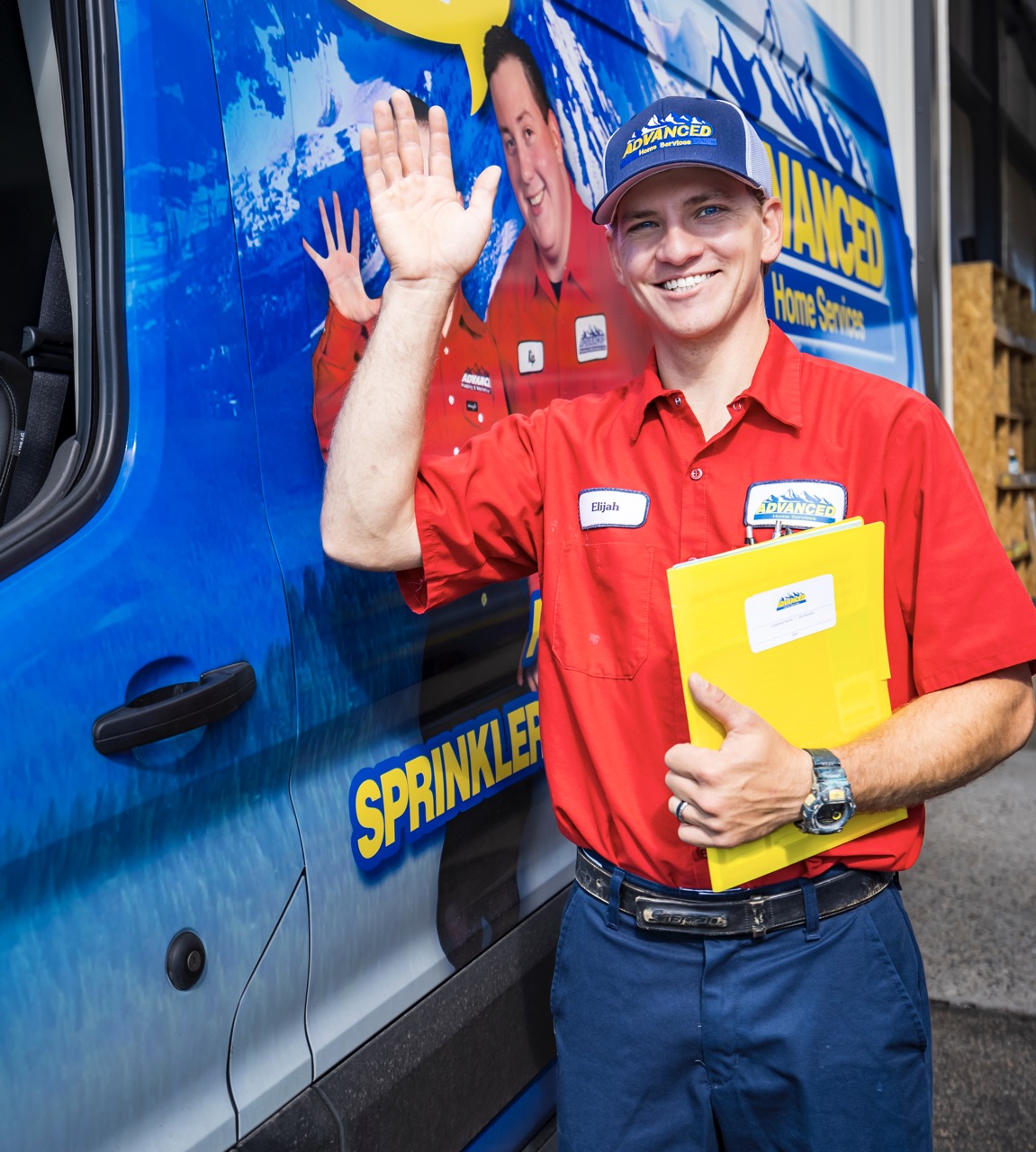 Technician waving as they arrive to a appointment.